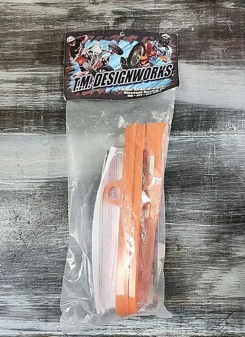 T.M. Designworks Chain Slider Dirt Cross Slider KTM 85 SX Orange DCS-K85-OR TC85